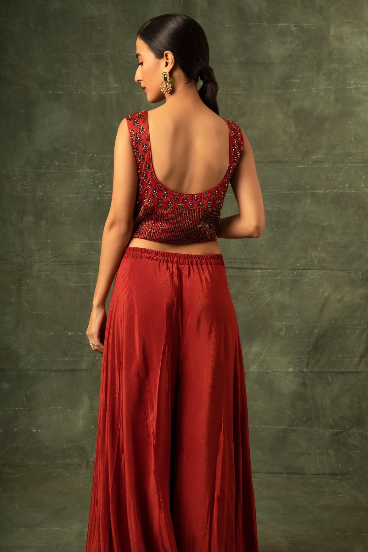 Red Ajrakh blouse and double layered flare pants with cape dupatta