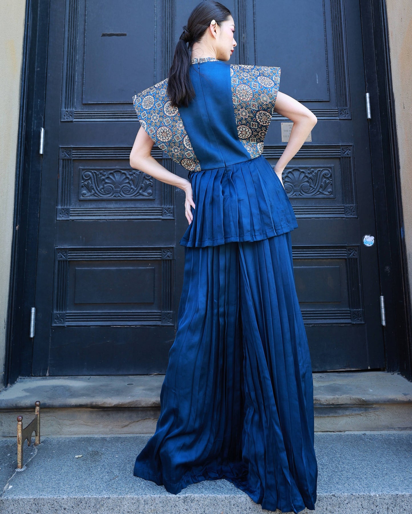 Coblat blue german satin and ajrakh pleated paplum top with pleated pants