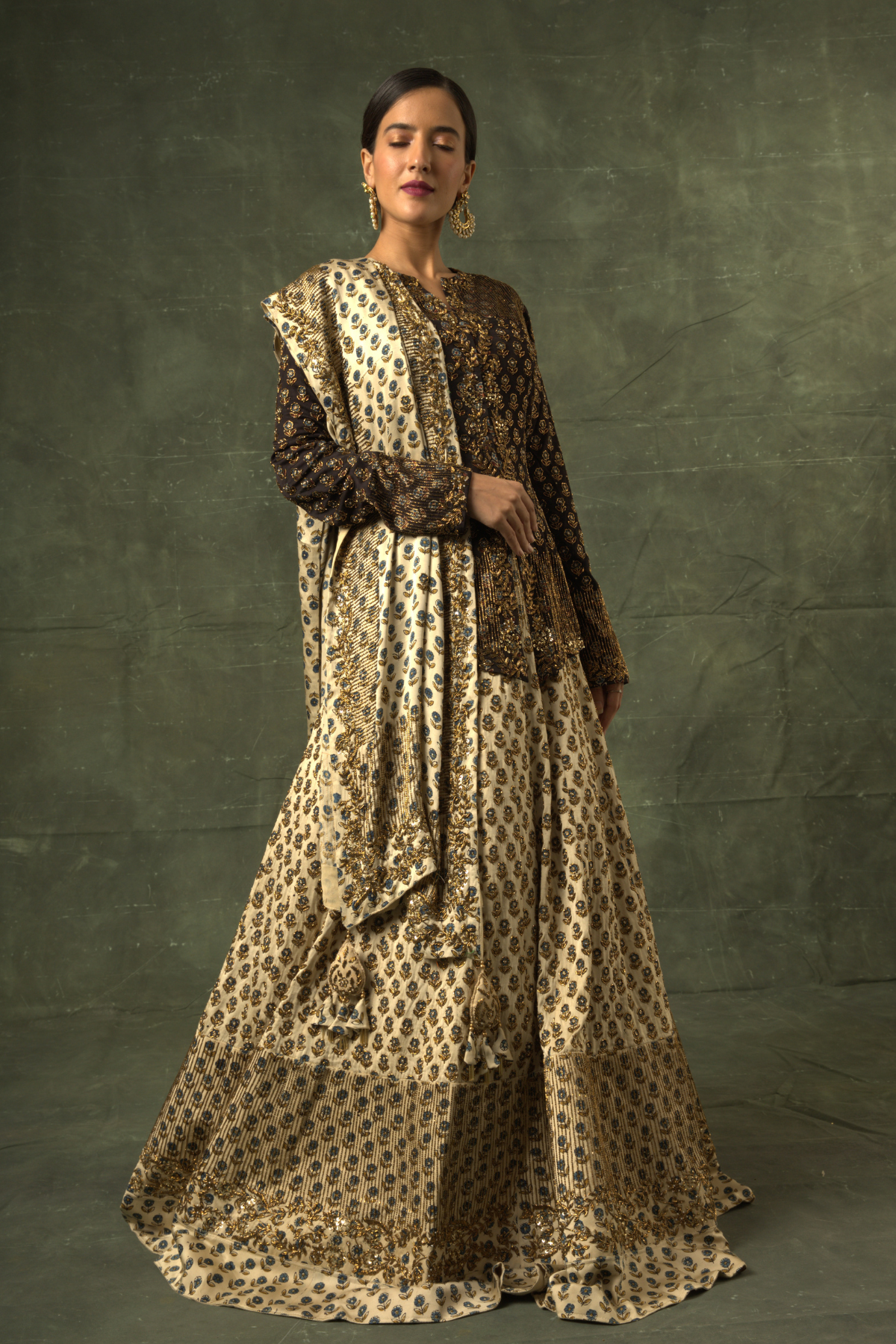 Black ajrakh jacket and Ivory lehenga with ivory ajrakh dupatta