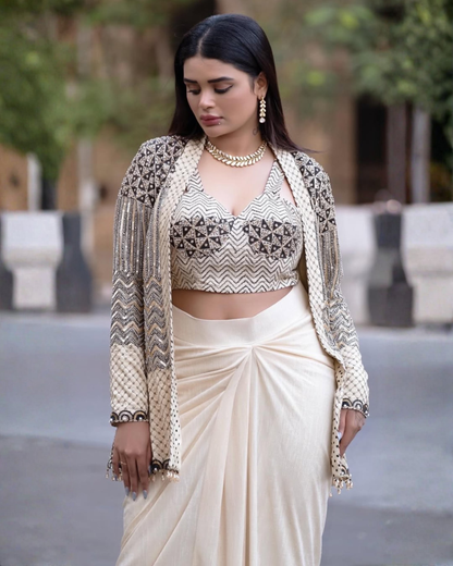 Shresta Iyer in Ivory Bralette Paired with Jacket and Drape Skirt