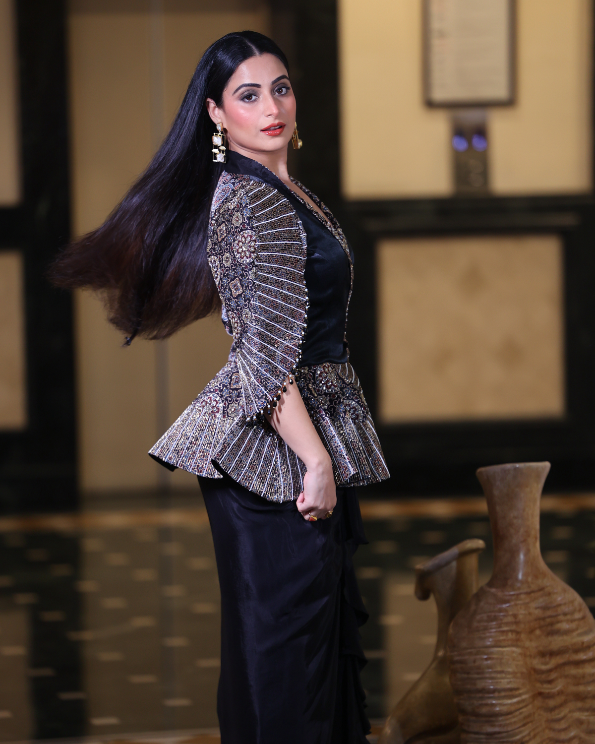 Aishwarya Sharma in Black Peplum Top with Drape Skirt