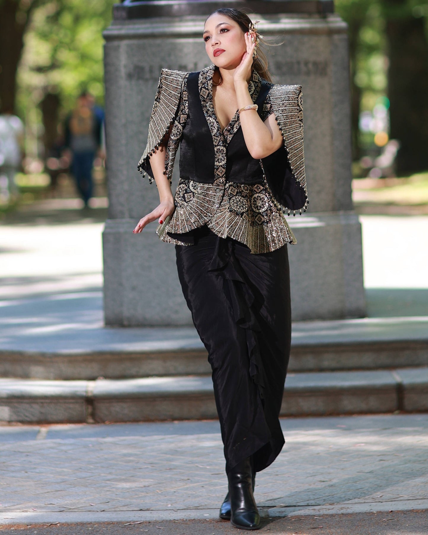 Black paplum top with drape skirt