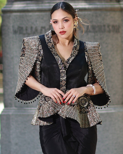 Black paplum top with drape skirt