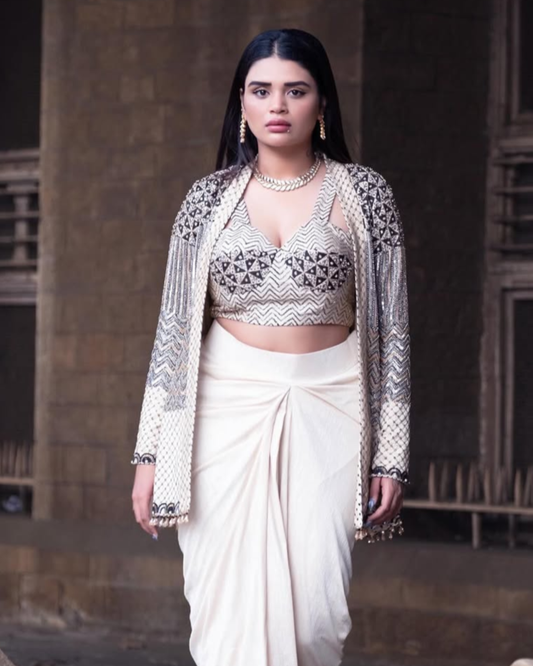 Shreshta Iyer in Ivory Bralette Paired with Jacket and Drape Skirt