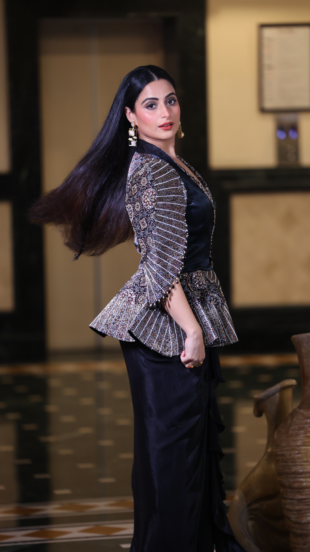 Aishwarya Sharma in Black Peplum Top with Drape Skirt