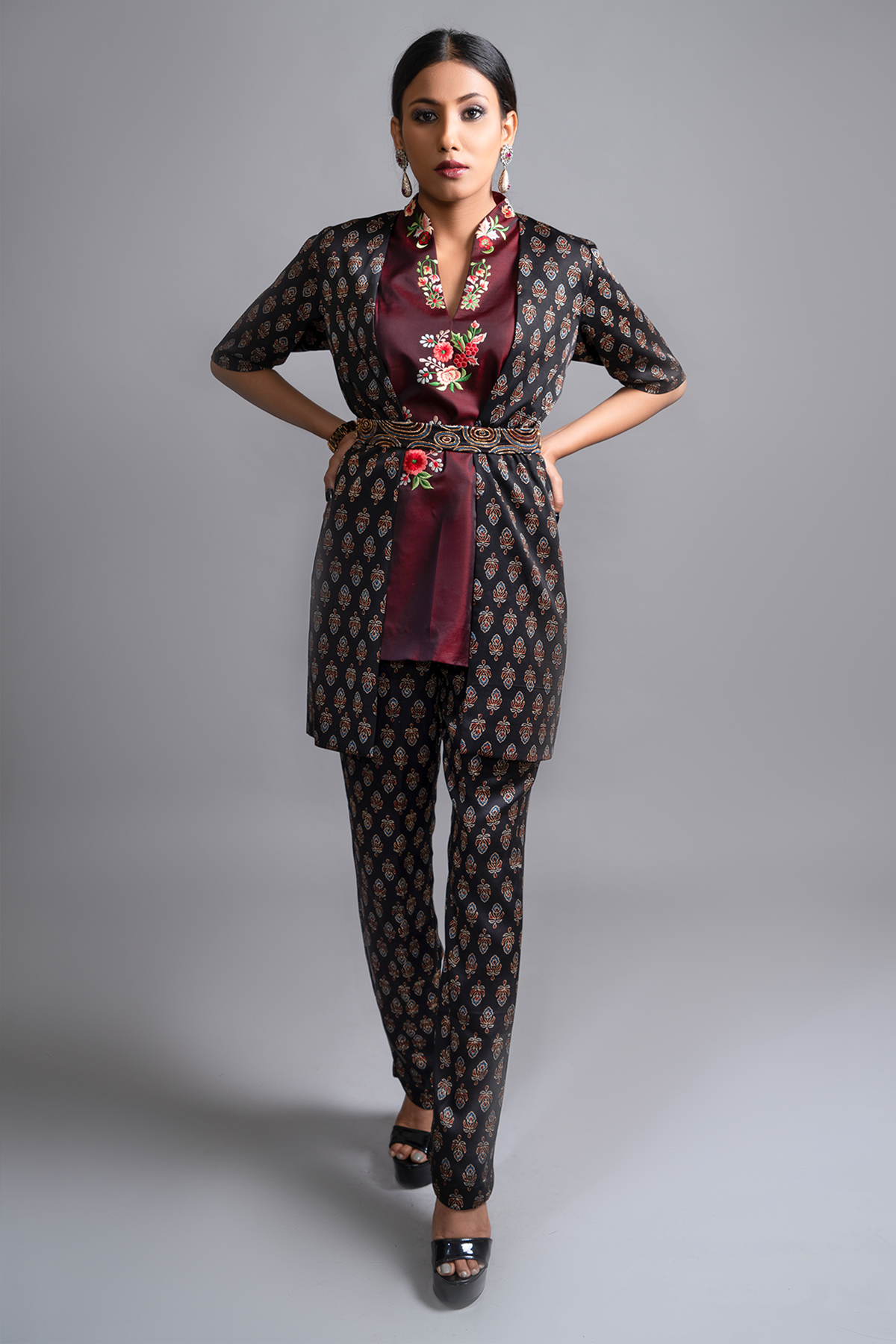 "Exquisite Ajrakh Pant Suit in Pure Modal Silk, Adorned with Nakshi and Zardosi Embroidery, Perfectly Paired with a Handcrafted Waistband."