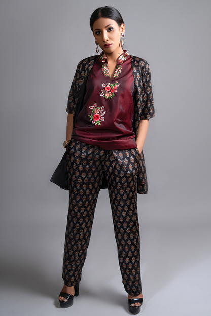"Exquisite Ajrakh Pant Suit in Pure Modal Silk, Adorned with Nakshi and Zardosi Embroidery, Perfectly Paired with a Handcrafted Waistband."