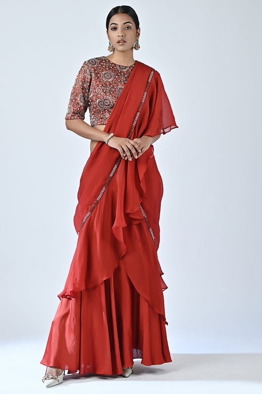 Red embroidered drape saree set