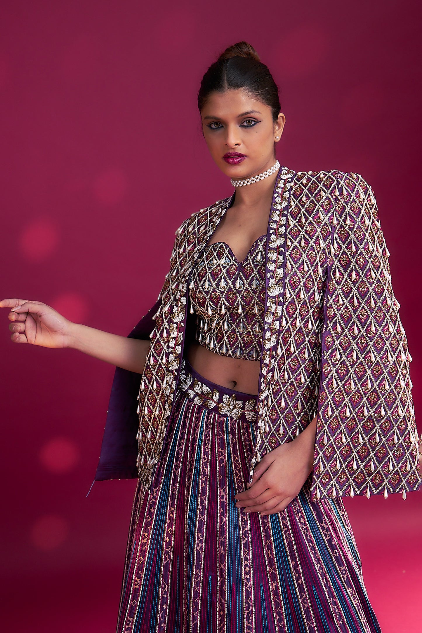 Dark purple ajrakh embellished blouse and jacket fir lehenga