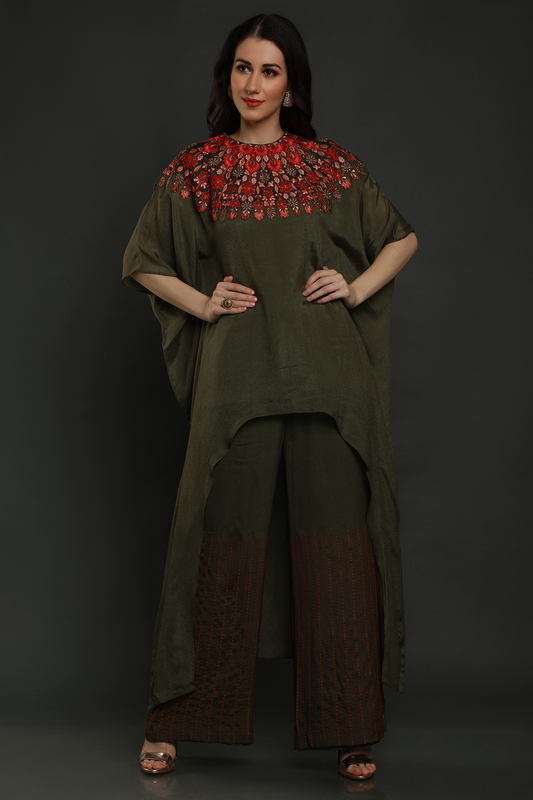 "Stunning bottle green crepe kaftan with threadwork & cutdana embellishments, paired with crepe pants - A perfect blend of style and comfort!"