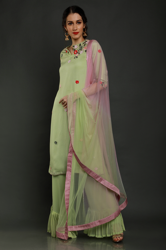 "Stylish crepe mint green kurta paired with pleated palazzo pants & shaded dupatta adorned with intricate threadwork, pearl beads & cutdana - Elegant ensemble!"