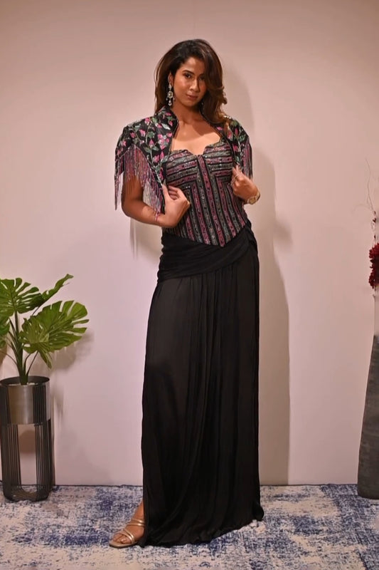 Nikki Deol in Black Embellished Short Jacket and corset with  Draped Skirt Set