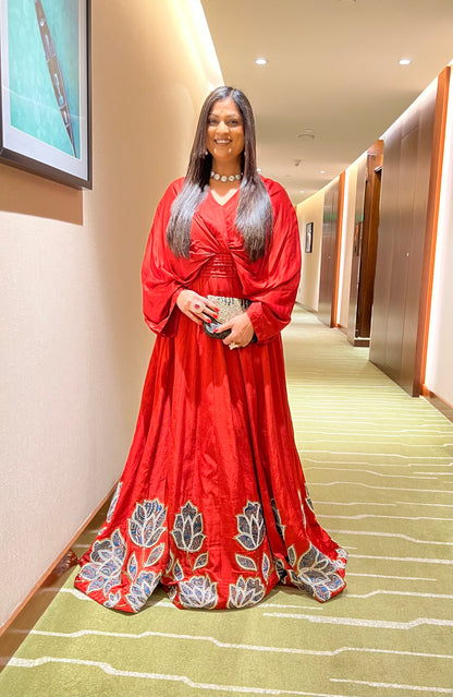 Richa Sharma in Red Poncho sleeve patchworked Gown with Belt