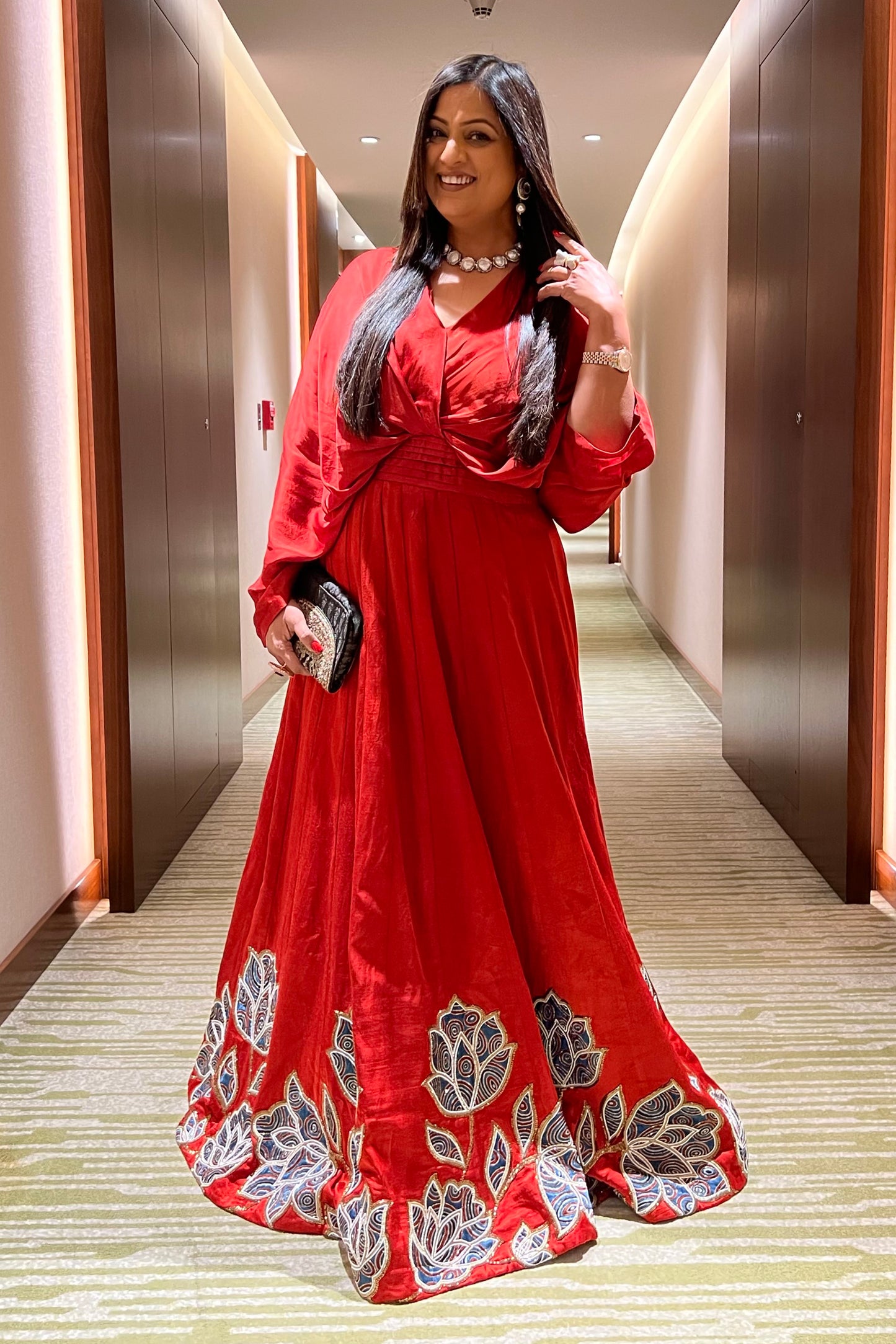 Richa Sharma in Red Poncho sleeve patchworked Gown with Belt