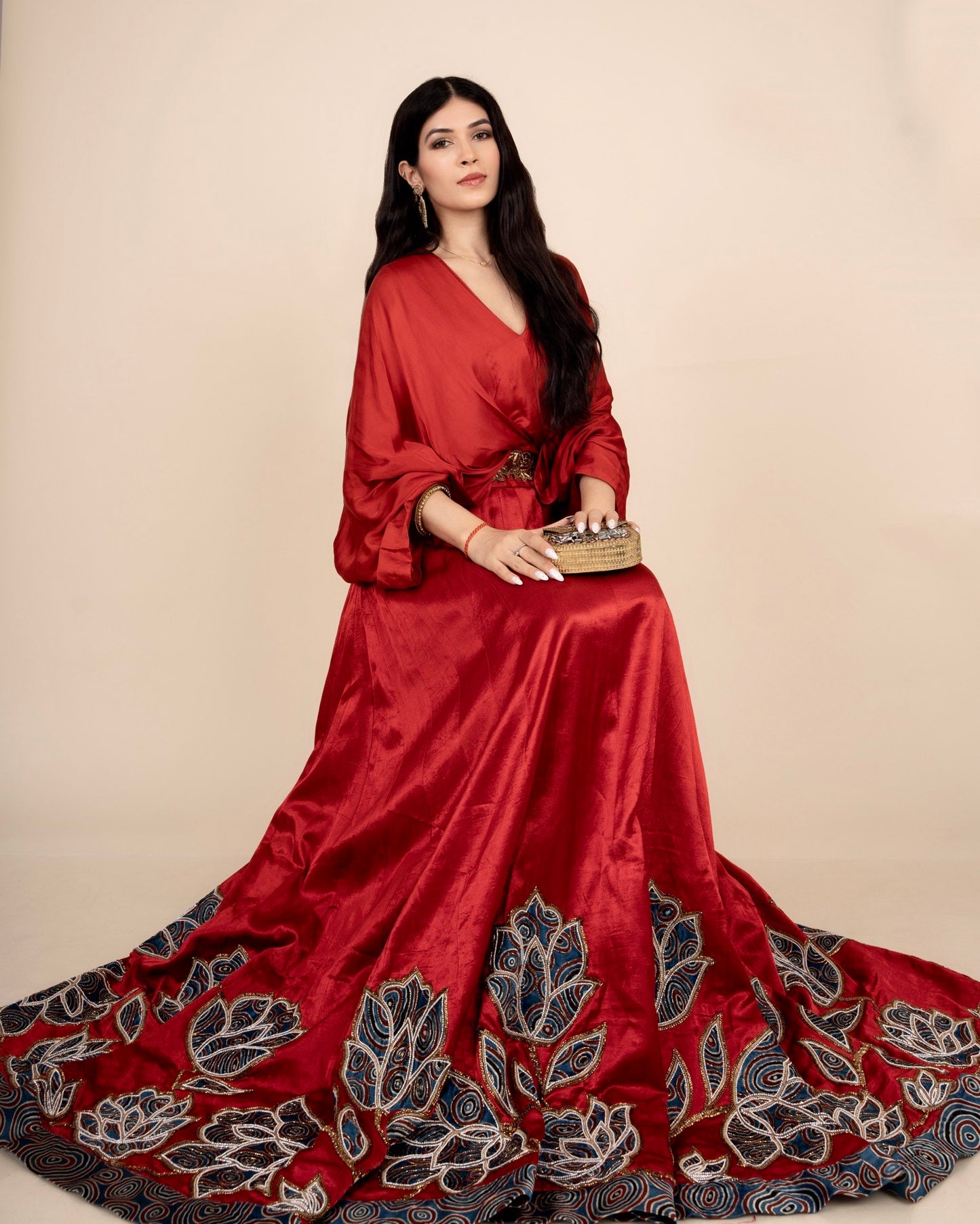 Baandgee Kalra in Red Poncho sleeve patchworked Gown with Belt