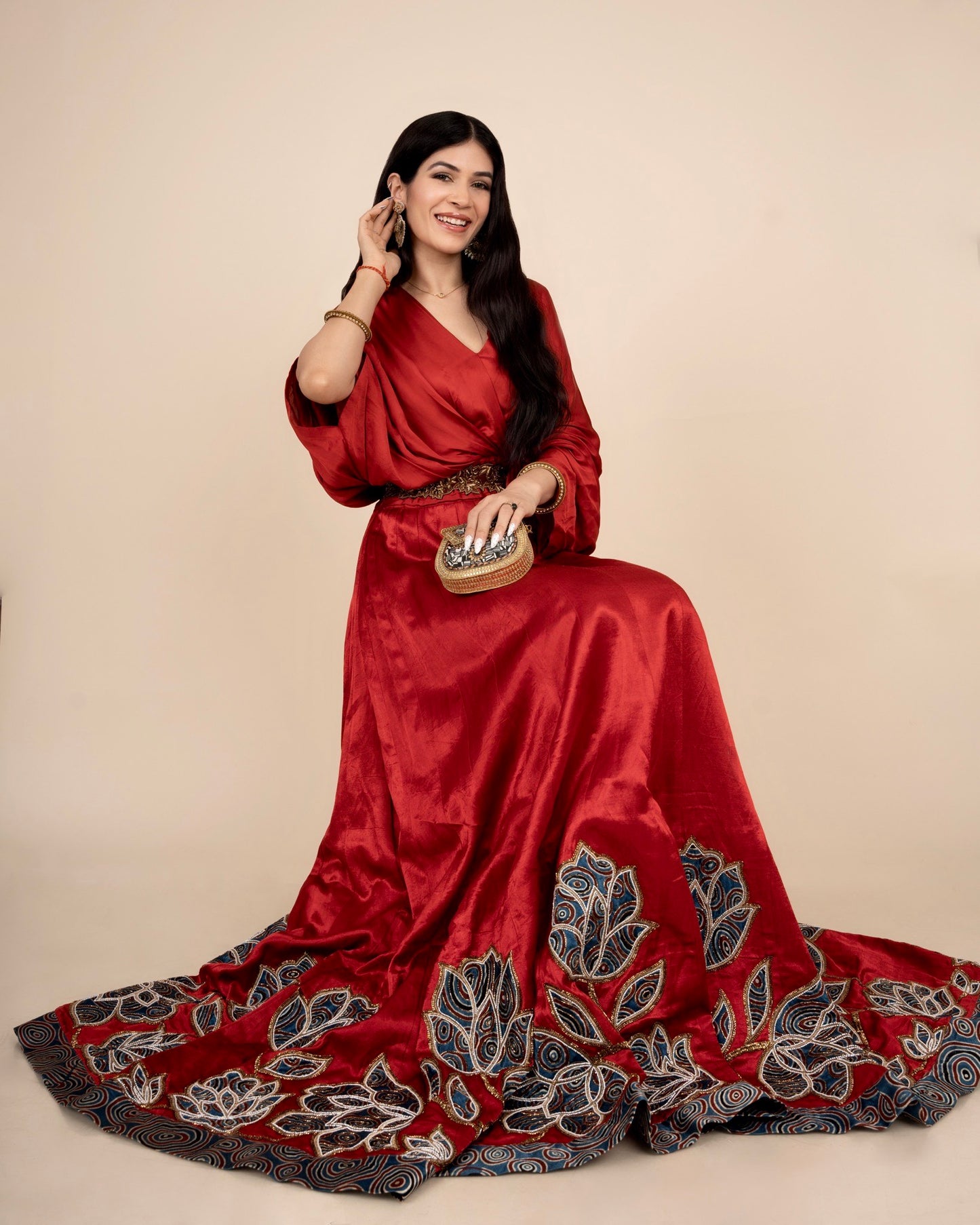 Baandgee Kalra in Red Poncho sleeve patchworked Gown with Belt