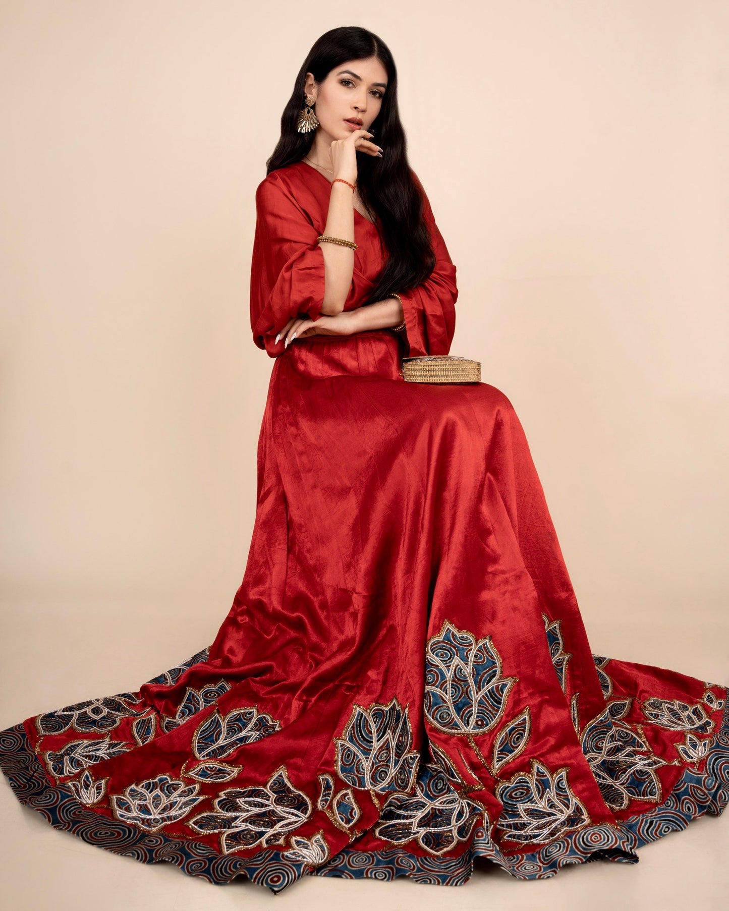 Baandgee Kalra in Red Poncho sleeve patchworked Gown with Belt
