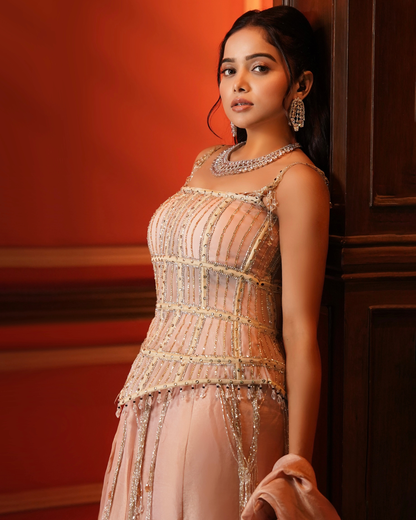Manisha Rani in Peach Corset Top with Flared Skirt