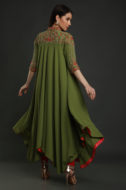 Elevate your elegance in a Mehendi Green Moss Crepe asymmetric maxi dress. Hand-embroidered with thread, pearls, and cut dana work for a unique flair.