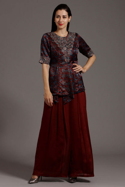 Anemone peplum top with pleated pants