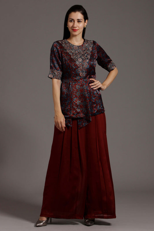 Anemone peplum top with pleated pants