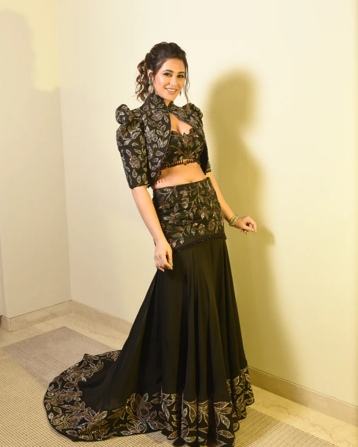 Nargis Fakhri in Black Embellished Jacket Fish Cut Lehenga Set