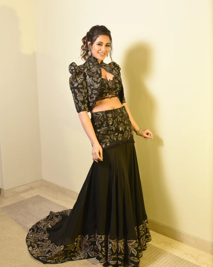 Nargis Fakhri in Black Embellished Jacket Fish Cut Lehenga Set