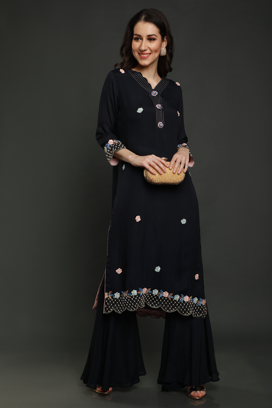 "Exquisite midnight blue crepe kurta paired with flared bottom garara style pants & shaded dupatta adorned with resham thread, moti beads, cutdana work"