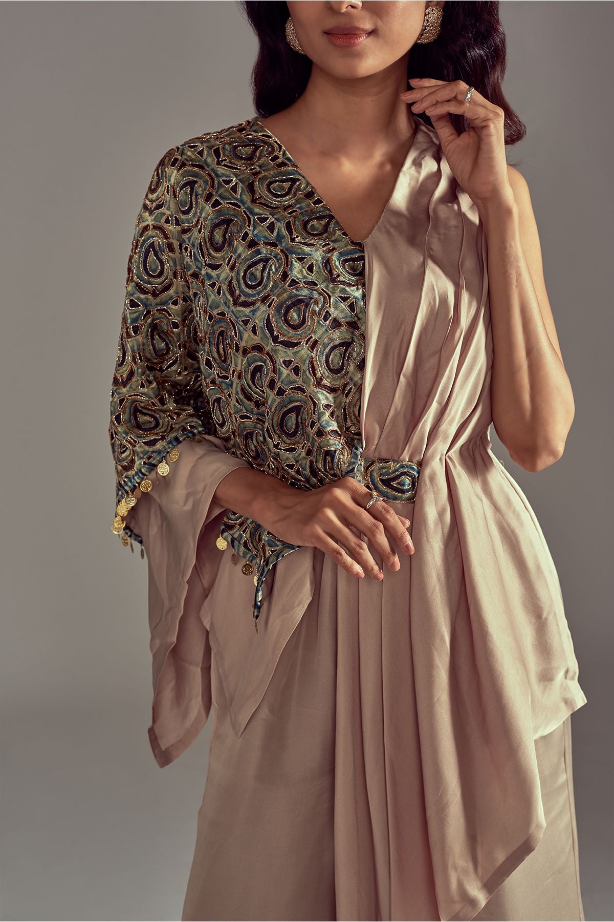 "Stylish Dark Beige Drape Jumpsuit in Pure Satin Crepe, featuring Intricate Detailing on the Flap. Embrace elegance and make a statement in this ensemble!"