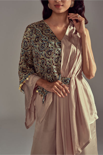 "Stylish Dark Beige Drape Jumpsuit in Pure Satin Crepe, featuring Intricate Detailing on the Flap. Embrace elegance and make a statement in this ensemble!"
