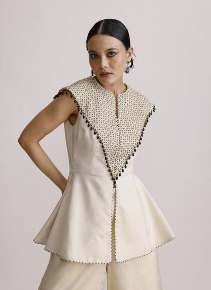 Ivory Paplum Top with Straight Pants