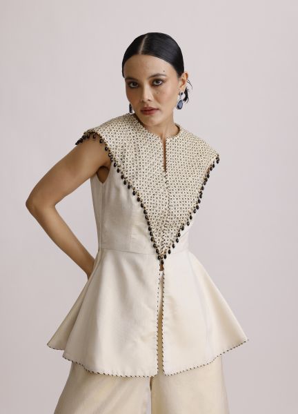 Ivory Paplum Top with Straight Pants