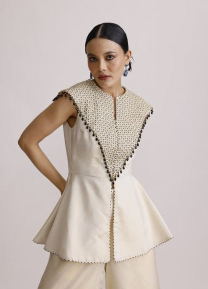 Ivory Paplum Top with Straight Pants