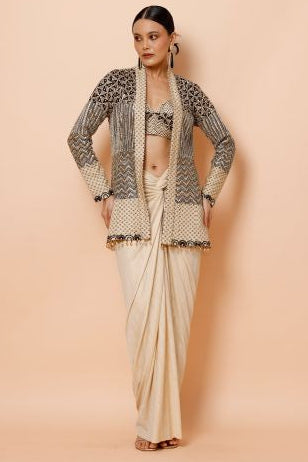 Woman wearing a patterned outfit on a beige background