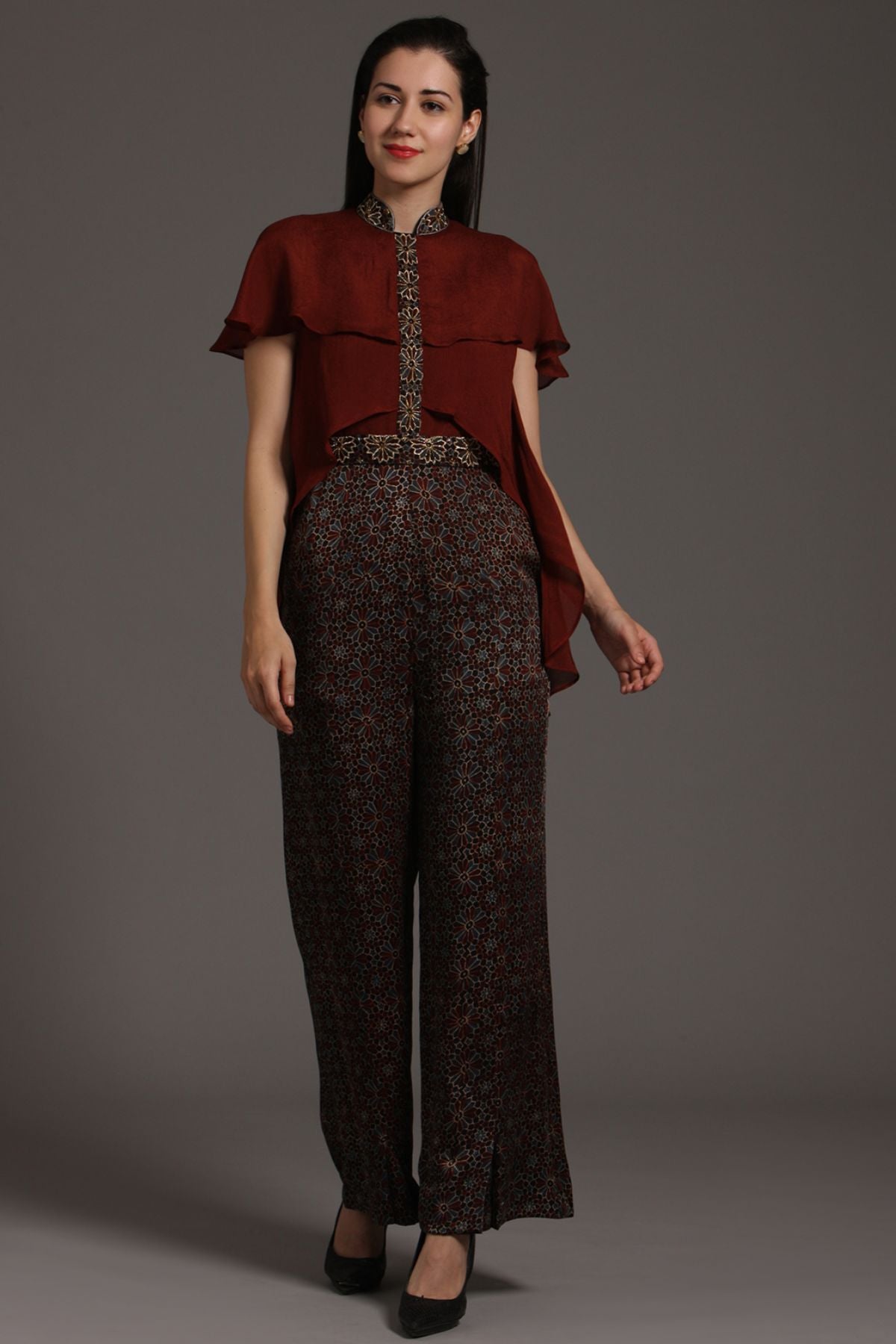 "Chic Jumpsuit in Pure Modal Silk Ajrakh with Layered Yoke Pattern in Crepe, featuring Intricate Embroidery on Waistband and Strip. Elevate your style!"