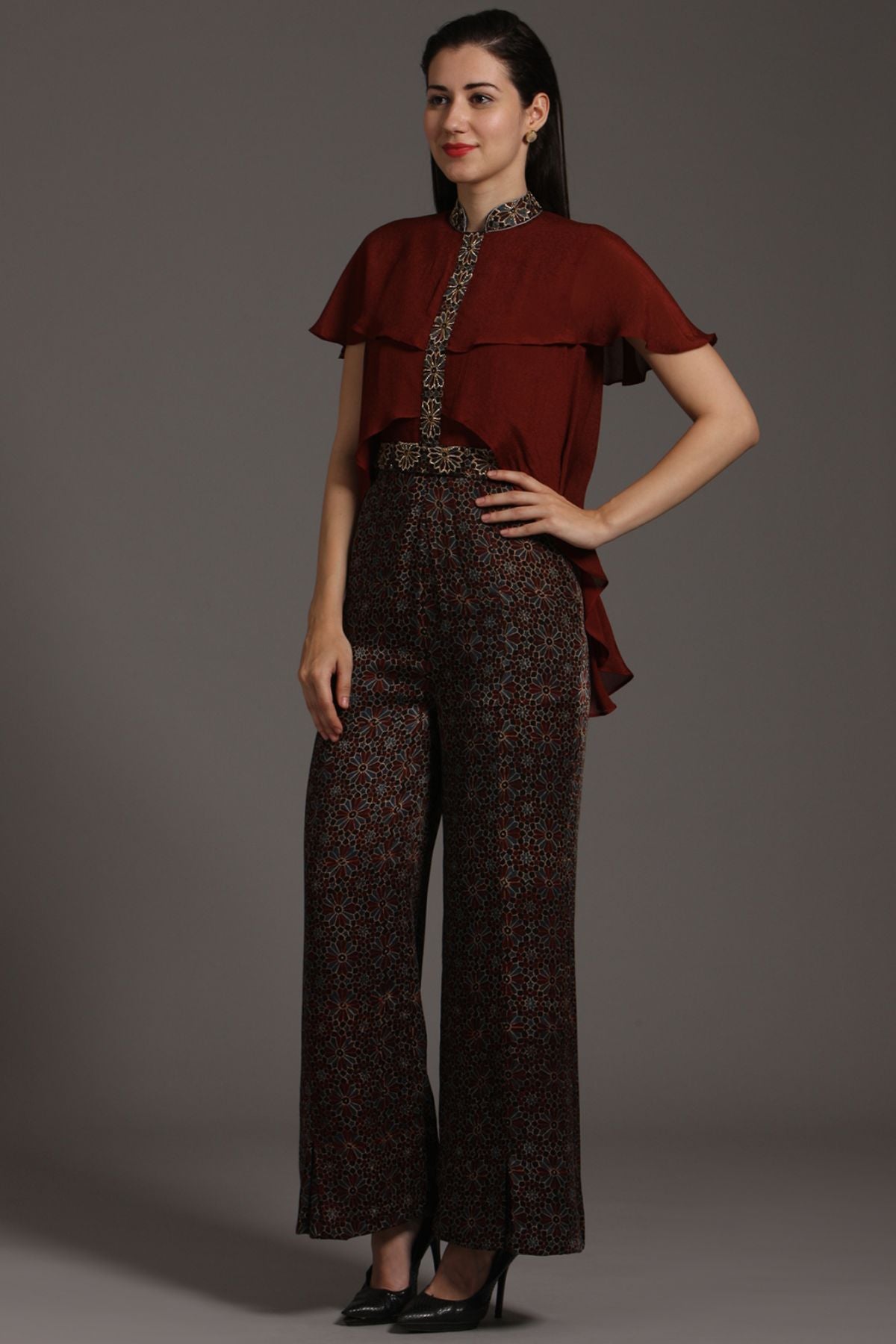 "Chic Jumpsuit in Pure Modal Silk Ajrakh with Layered Yoke Pattern in Crepe, featuring Intricate Embroidery on Waistband and Strip. Elevate your style!"