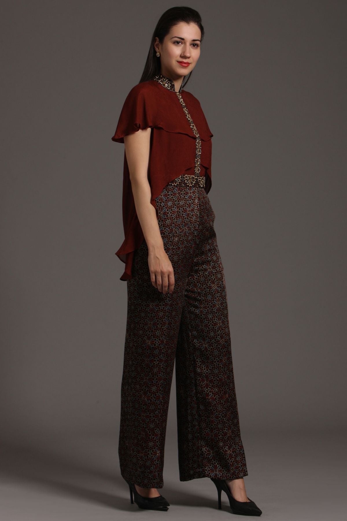 "Chic Jumpsuit in Pure Modal Silk Ajrakh with Layered Yoke Pattern in Crepe, featuring Intricate Embroidery on Waistband and Strip. Elevate your style!"