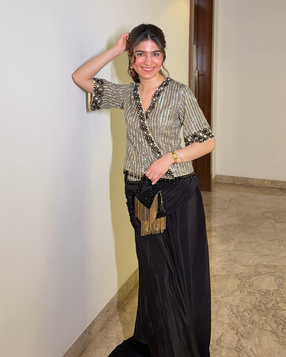 Tanya Khubchandani in Shimmer Tissue Embroider Top with Drape Skirt
