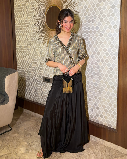 Tanya Khubchandani in Shimmer Tissue Embroider Top with Drape Skirt