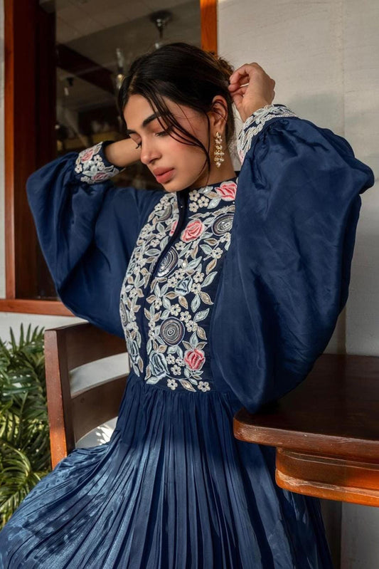 Yashita Chandrashekhar in Blue embroidered butterfly sleeve gathered dress.