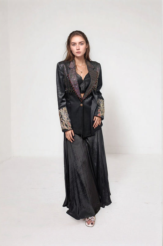 Black blazer paired with bralette and flare pants