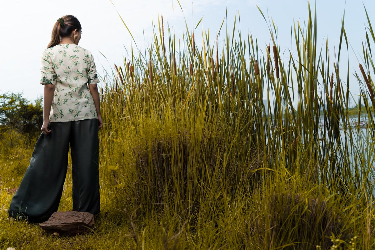 Blossom Assymmetric top with grey pleated pants