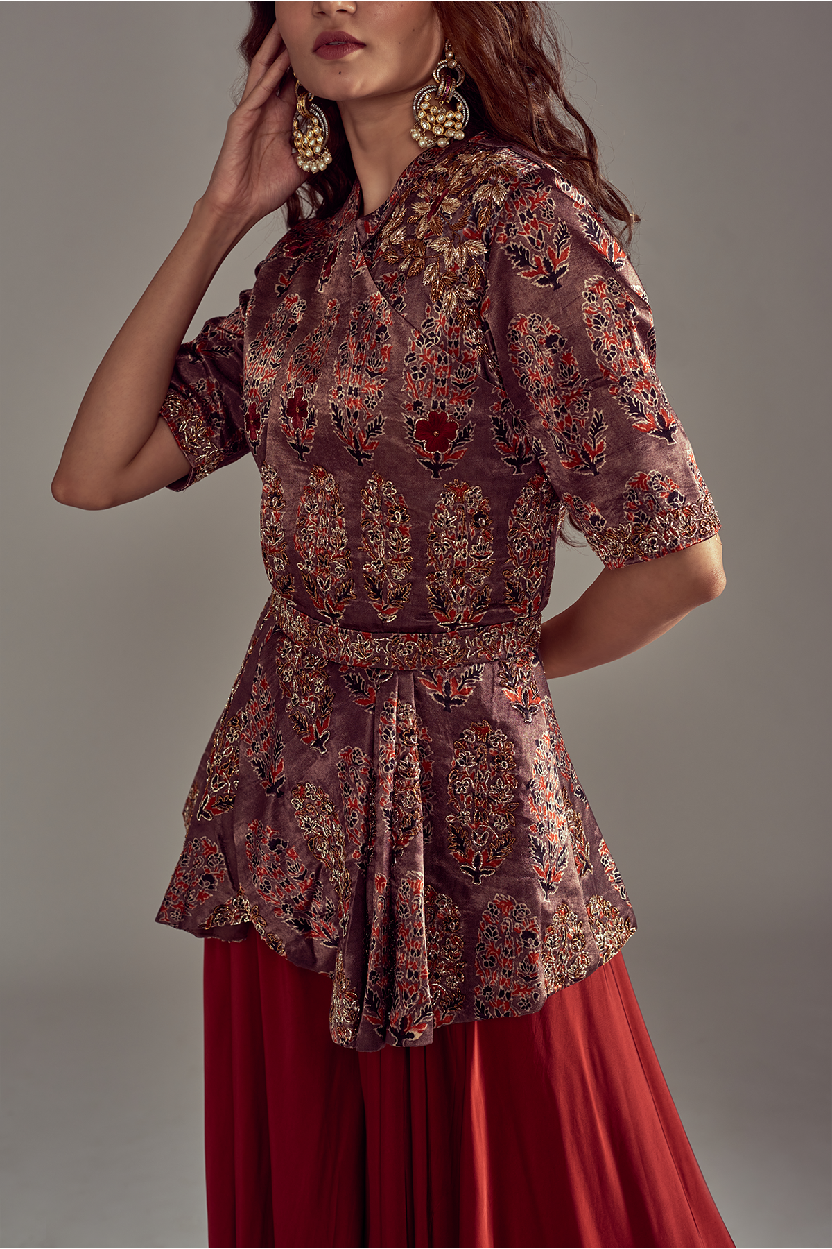 "Stunning Ajrakh printed peplum jumpsuit embellishment with nakshi embroidered in pure mashru silk and pure satin crepe."
