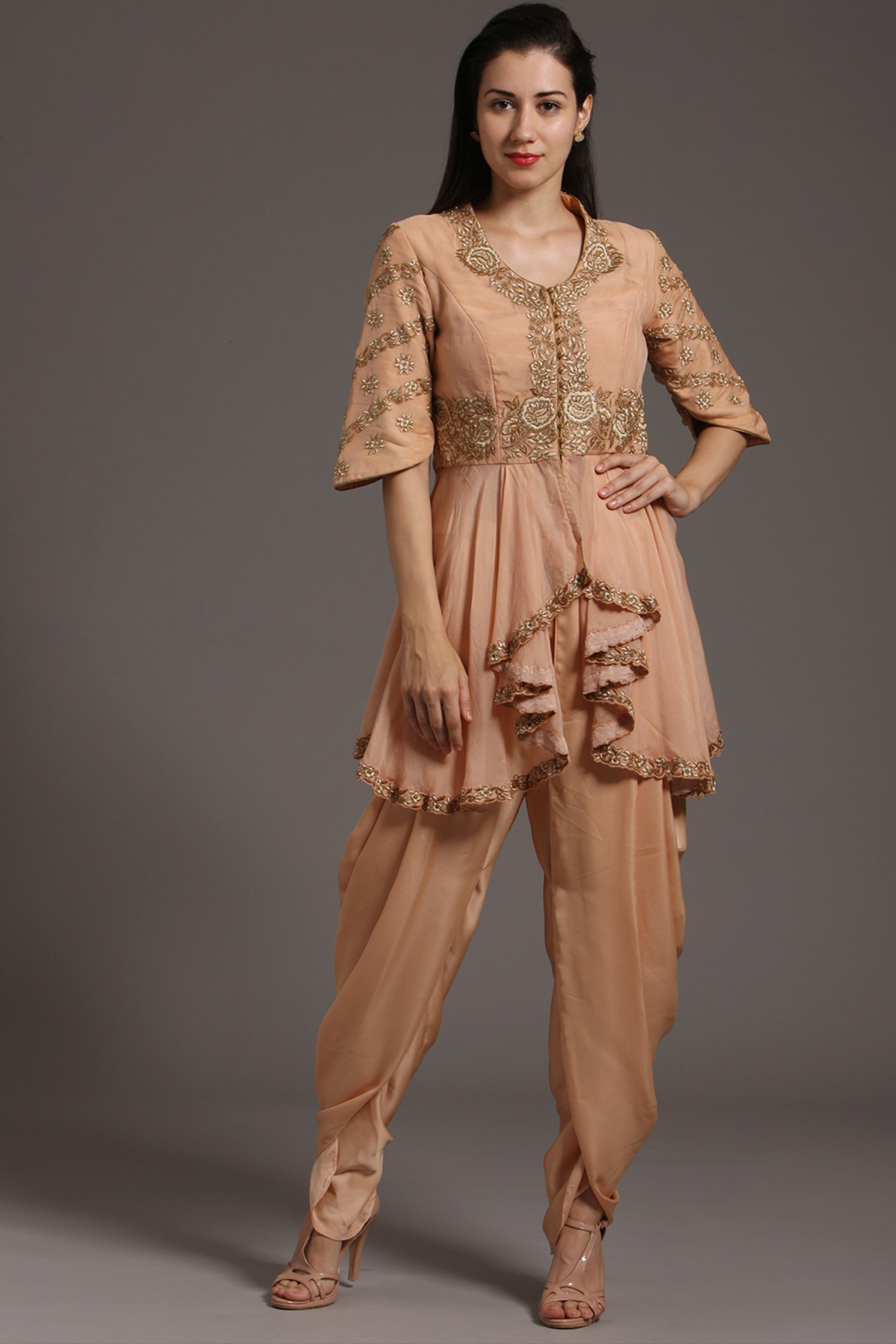 "Graceful Peach Organza Peplum Tunic with Embroidery, paired with Crepe Dhoti Pants. Embrace elegance and shop now for your special occasions."