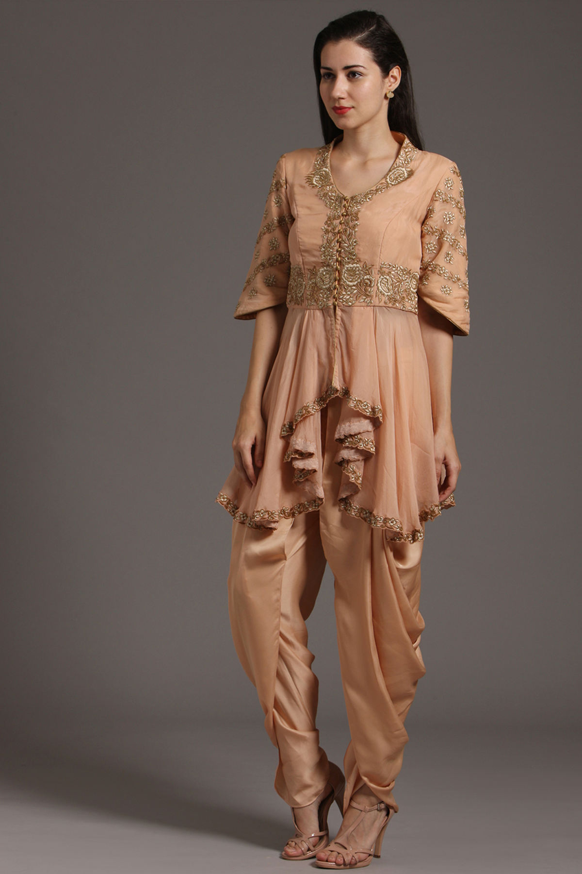 "Graceful Peach Organza Peplum Tunic with Embroidery, paired with Crepe Dhoti Pants. Embrace elegance and shop now for your special occasions."